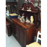 Victorian mahogany chiffonier with ledge back, frieze drawer and two panelled doors below on platfor