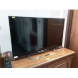 Sony Bravia flatscreen television model number KDL-32W53A with remote control