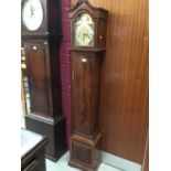 Good quality grandmother clock with arched gilt and silvered dial, chiming movement in mahogany case