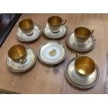 Group of Royal Worcester cabinet cups and saucers