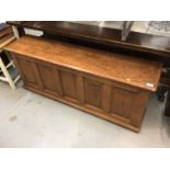 Narrow oak hall chest /seat with rising lid and panelled decoration 139 cm