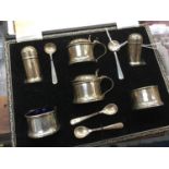 Silver cruet set, cased