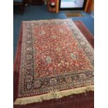 Eastern rug with geometric decoration on red and blue ground