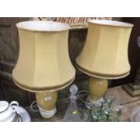 Pair of yellow glazed oviform table lamps with silk shades