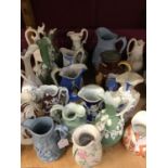 Collection of Victorian coloured relief moulded jugs