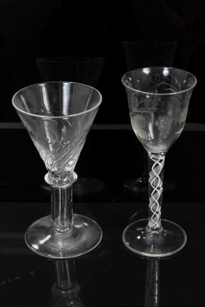 Georgian-style opaque twist stem wine glass with etched foliate decoration to the bowl, and a furthe