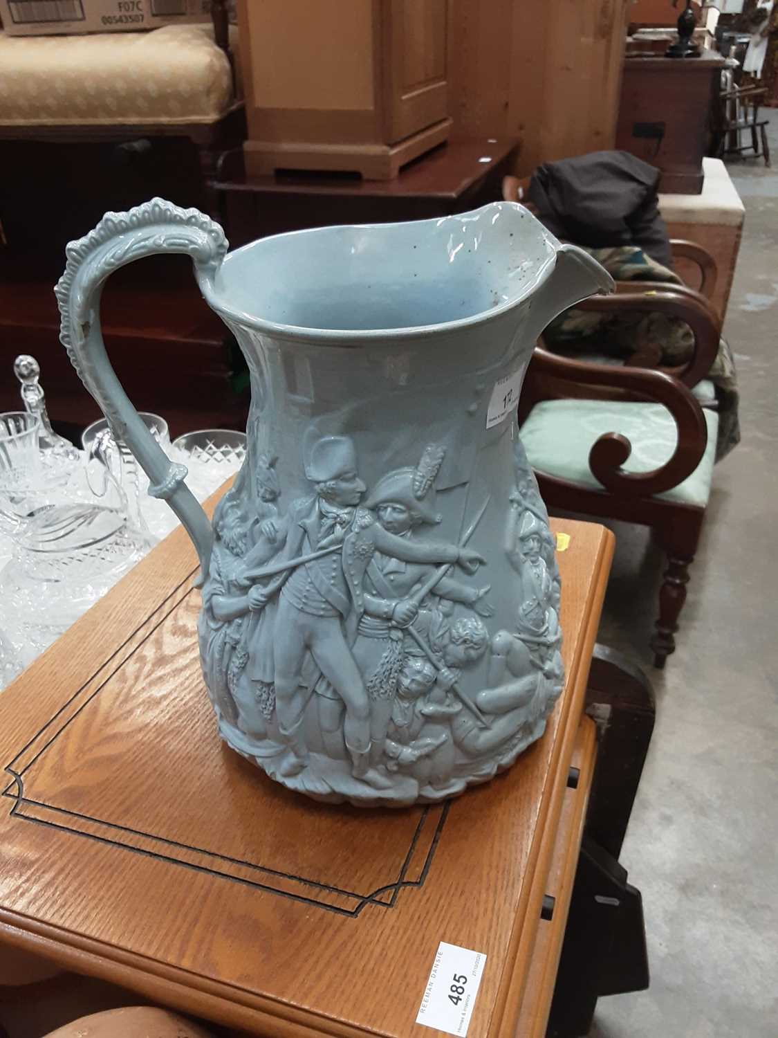 Unusually large Victorian egg shell blue glazed jug, depicting a battle scene, 28cm high