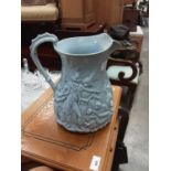 Unusually large Victorian egg shell blue glazed jug, depicting a battle scene, 28cm high