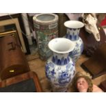 Pair of Chinese blue and white vases together with a Chinese stick stand (3)