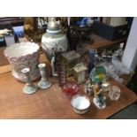 Group of ceramics and glassware to include paperweights, vases and two clocks