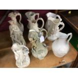 Two Victorian Parian figures and collection of seven relief moulded jugs