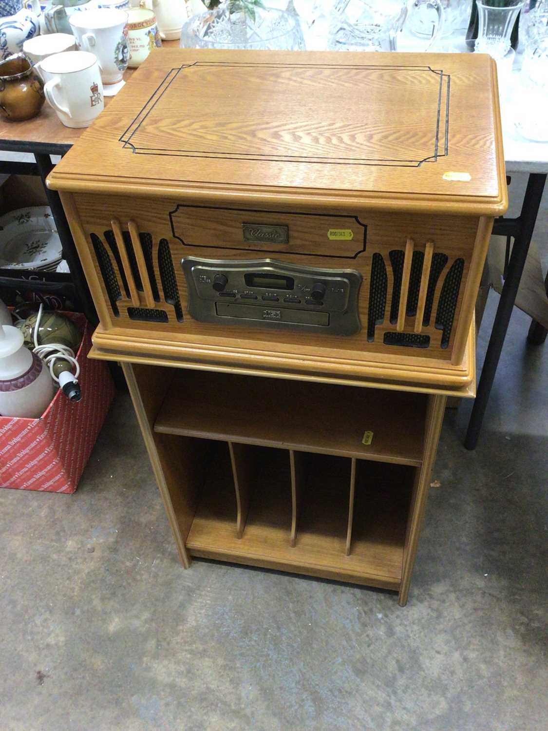 Classic Collector's Edition record player in light oak case and matching record cabinet