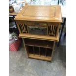 Classic Collector's Edition record player in light oak case and matching record cabinet