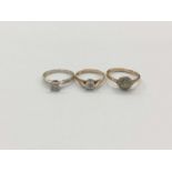 Three 9ct gold diamond set rings