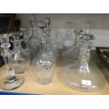 Pair of ships decanters together with two other pairs of decanters and other cut glass decanters and