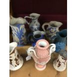 Collection of Victorian polychrome relief moulded jugs (8)