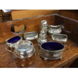 Group of silver salts, pepperettes and a mustard pot (8 pieces)