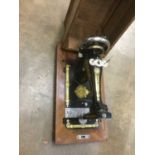 Antique hand sewing machine in walnut case