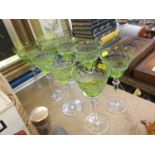 Set eight 1920s Bohemian green overlaid hock glasses