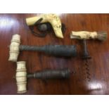 Three Victorian cork screws and a faux ivory parasol handle