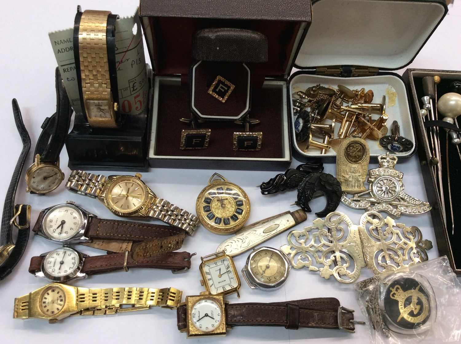 Various wristwatches including vintage Timex, silver and mother of pearl fruit knife, cufflinks, hat
