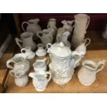 Collection of Victorian relief moulded jugs. approximately 19