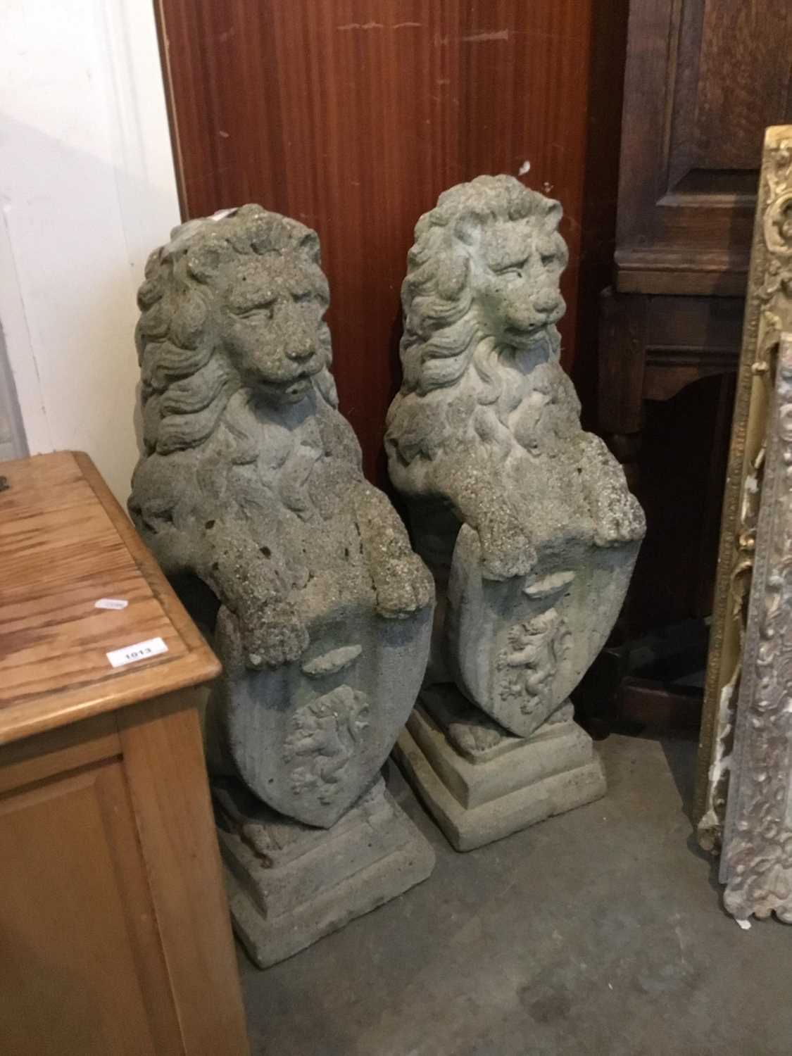 Pair of re-constituted stone lions