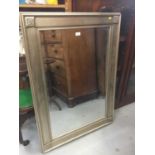 Wall mirror in silvered frame
