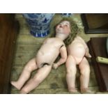 Two Continental bisque head dolls