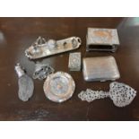 Group of assorted silver items to include a cigarette case, misers purse, miniature tea set and matc