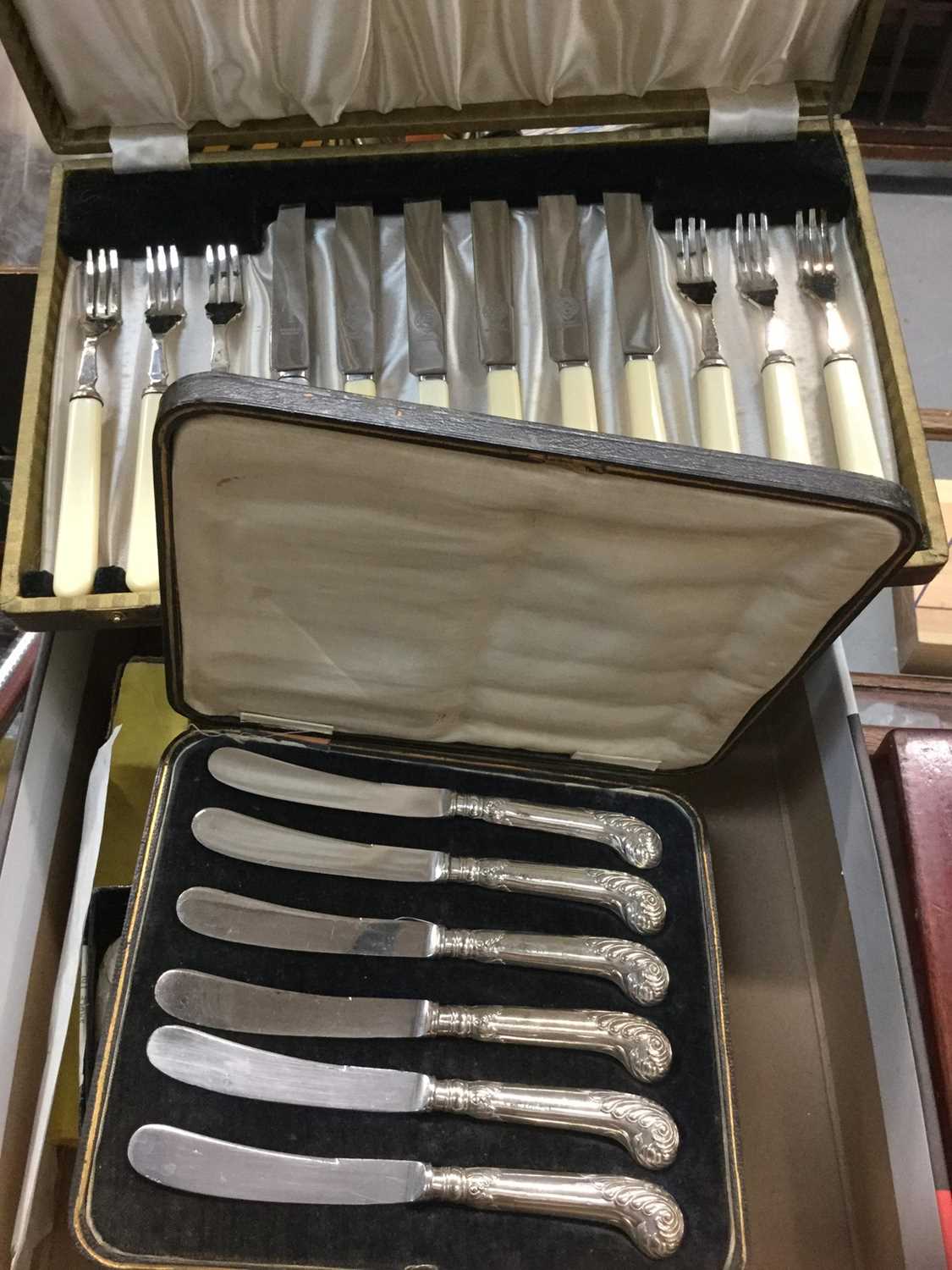 Cased set of silver handled knives, cased Mappin and Webb silver-plated and mother of pearl knives a