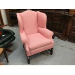 Good quality Contemporary wing back arm chair with pink striped upholstery