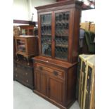 Late Victorian walnut bureau bookcase with leaded glazed doors enclosing adjustable shelves , fitted