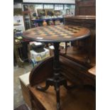 Victorian walnut tripod games table with chess board top