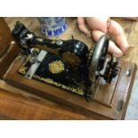 Two antique sewing machines