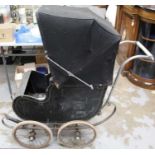 Early 20th Century pram with wire wheels, black painted wooden body and canvas hood, by Hitchings of