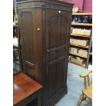 1950s oak hall wardrobe with linen fold decoration