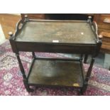 1920s oak tea trolley with tray top and baize-lined interior compartment- two tier