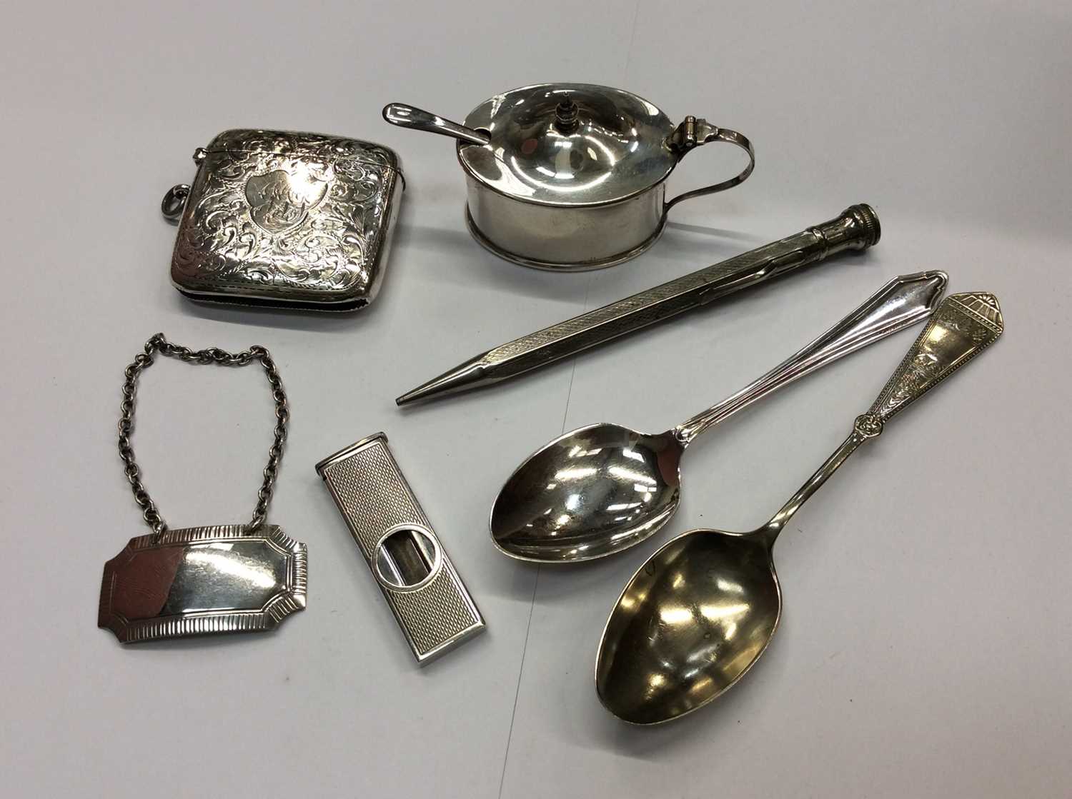 Large late Victorian silver vesta case, and other silver items including cigar cutter, mustard pot,