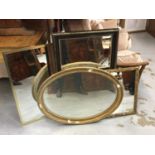 Oval gilt framed bevelled wall mirror together with three other wall mirrors (4)