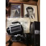 Nikon SLR camera, Compact 400 cine camera, old newspapers, framed signed photograph of Donald Sinden