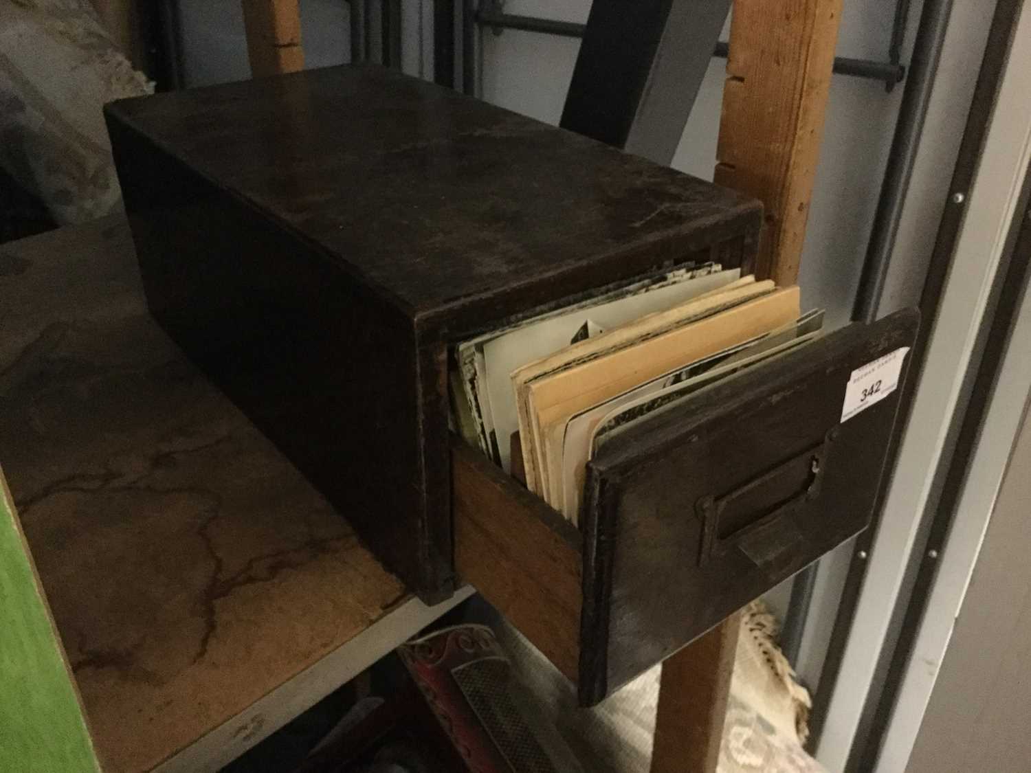 Collection of old topographical postcards in an oak filing drawer