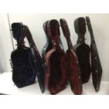 Five full size cello hard cases, two with incomplete lining, all with dirt to exterior and minor wea