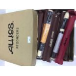 Eight Aulos soprano recorders model 303N, together with eight 103N soprano recorders, all cased and