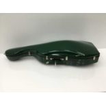 Good quality cello case by Paxman Ltd., with metallic green finish, together with cello bow, interna