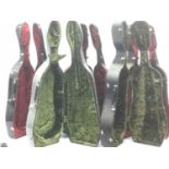 Five full size cello hard cases, two with incomplete lining, all with dirt to exterior and minor wea