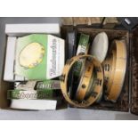 Collection of tambourines and other percussion, mostly unused old stock condition