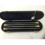 Cased set of four conductor's batons