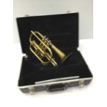 King brass cornet, model 605, serial number 506883, together with a Benge 7 mouthpiece, cased, as ne