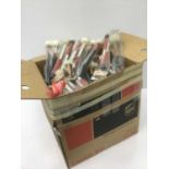 Large box full of drum soft sticks and beaters